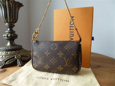 louis vuitton discovery pochette|louis vuitton monogram accessories.